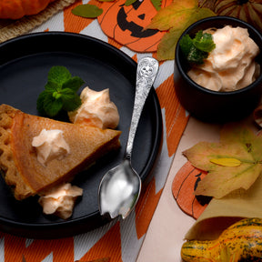 Gourdy - The Jack - O - Lantern Spork set on a Halloween-themed dinner table