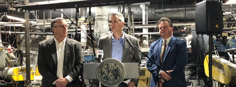 Greg Owens, Sherrill Manufacturing CEO, Rep. Anthony Brindisi and Matthew Roberts, at a press conference, in Sherrill, NY.