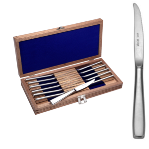 American Industrial 12-Piece Steak Knife Set with Chest on white background.