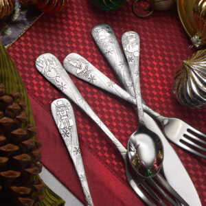 Holidays flatware set on red placemat