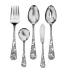 Honey Bee flatware serving set shown on a white background