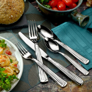 Lincoln flatware on table shown on a decorative table.