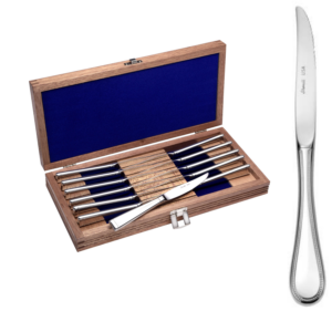 Pearl 12 piece steak knife set with chest shown on a white background