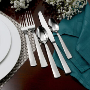 Satin America flatware set shown on decorative table