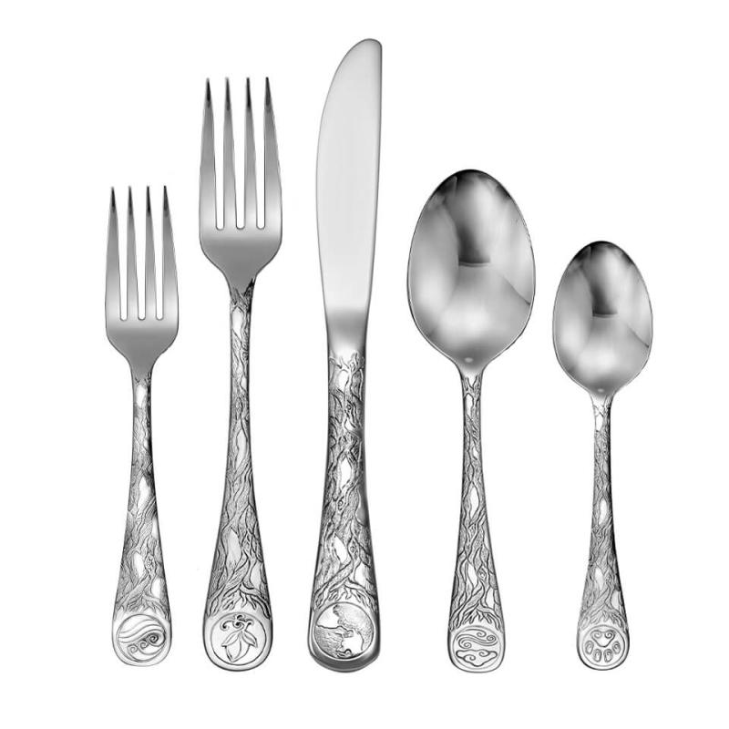 Earth flatware 5 piece set on white background.
