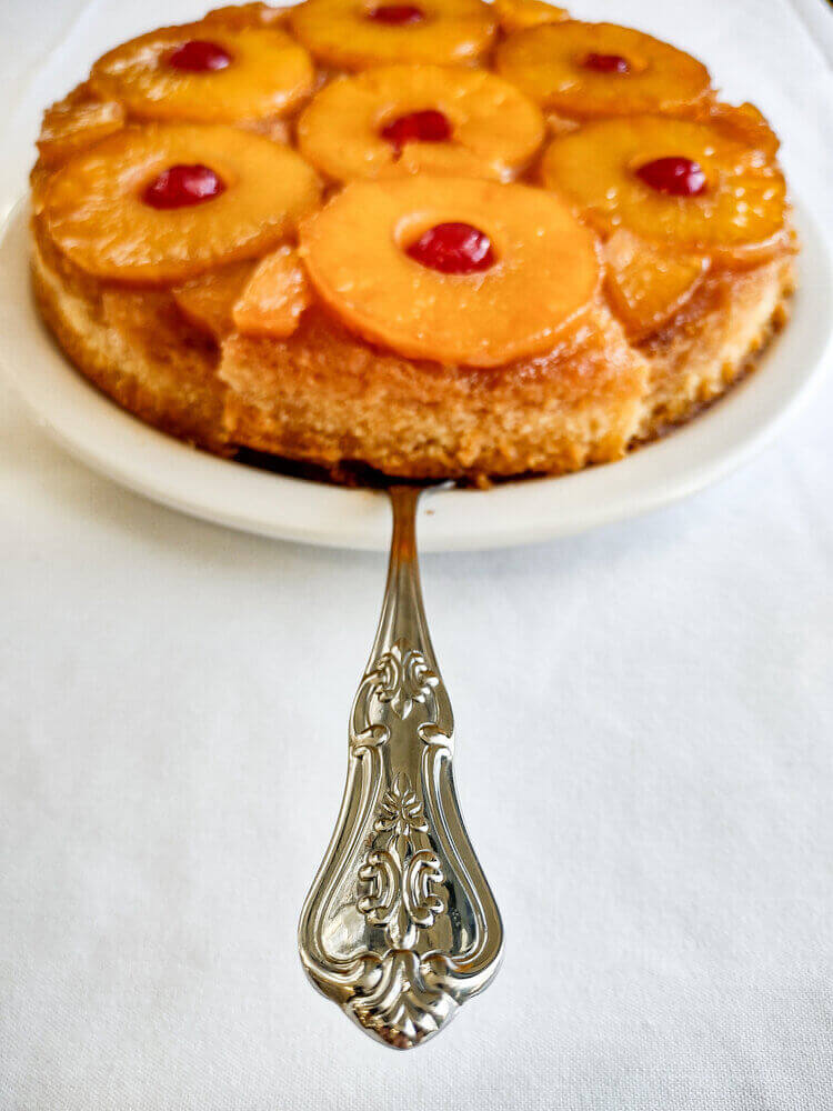 Pineapple upside down cake on spoon