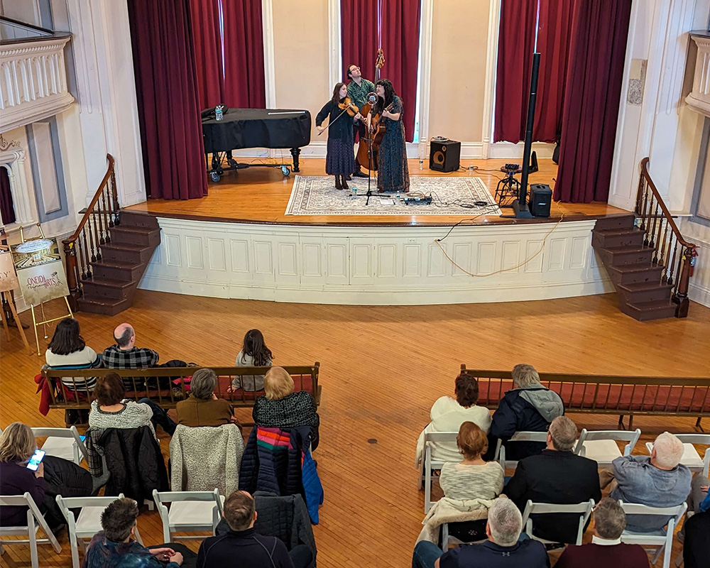 Rachel Sumner & Traveling Light on stage at the Oneida Community Mansion House Series 
