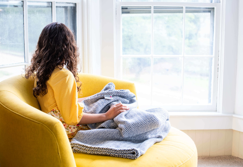 Women Sitting with American Blossom Linens.