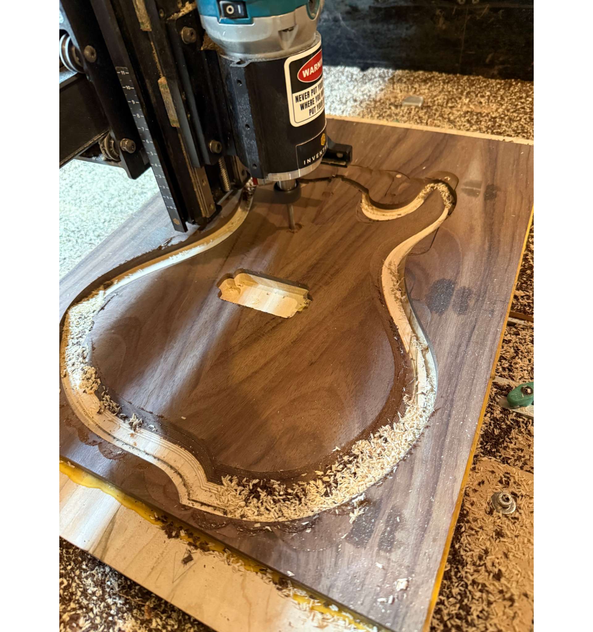 CNC Machine creates Body of the Electric Guitar