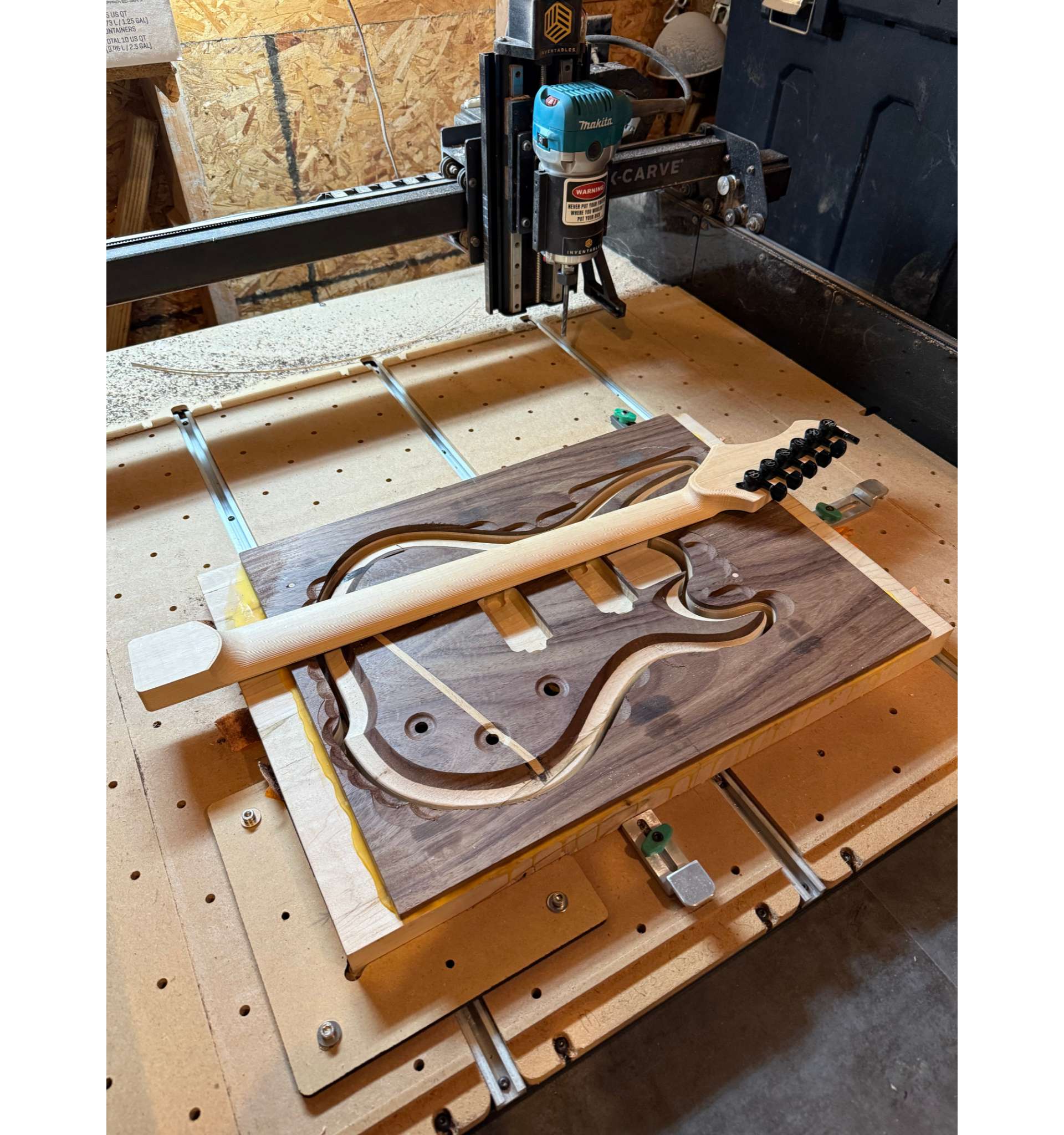 The neck and the body of the handcrafted wooden Electric Guitar